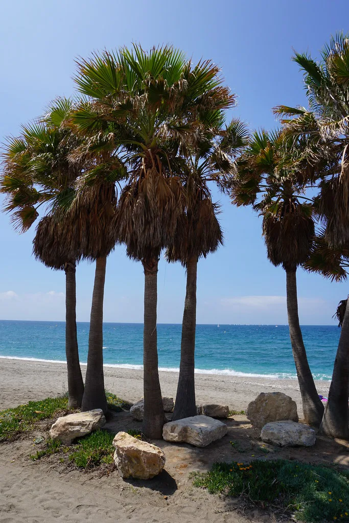Almeria's seafront beach and coastal promenade, shared by cyclists and pedestrians