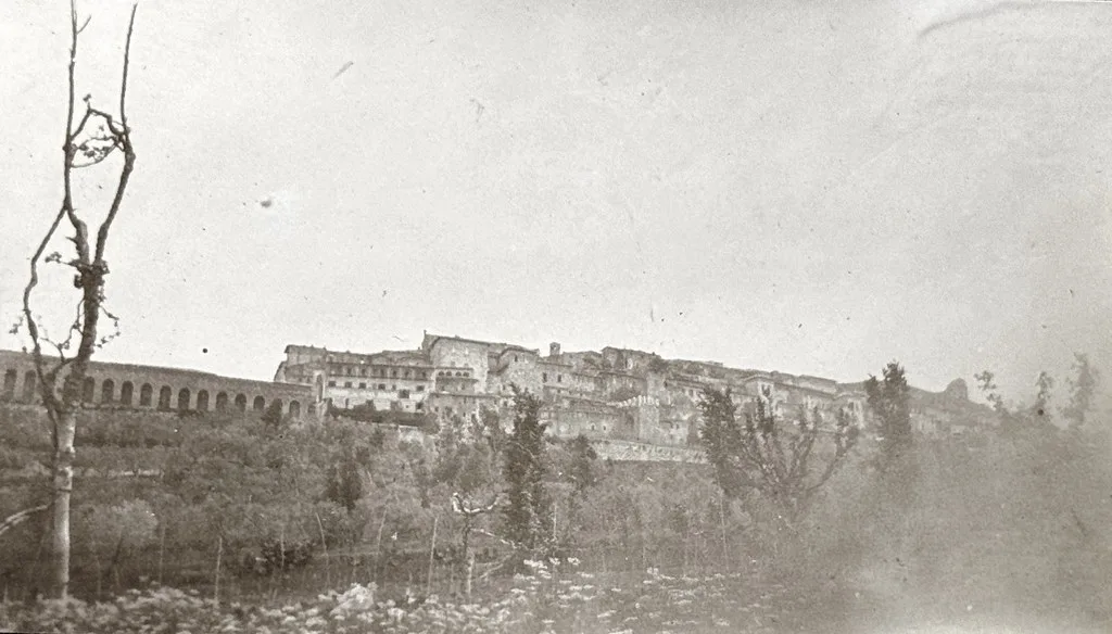 The domed Basilica of Santa Maria degli Angeli in the valley below Assisi, near the free valley parking and train station