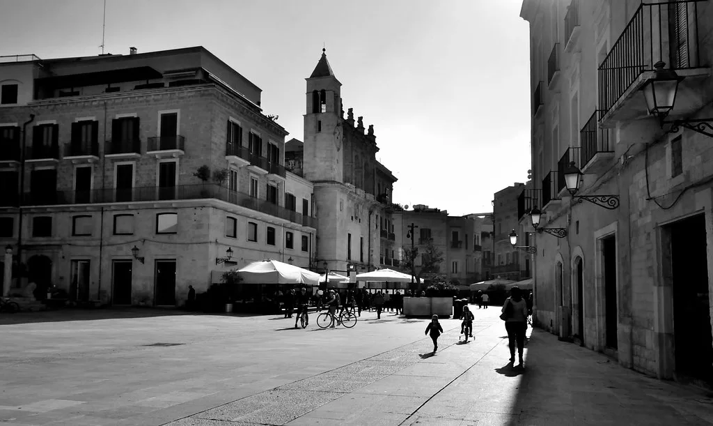 A narrow street in Bari's old town, the kind of central area best reached on foot or by AMTAB city bus
