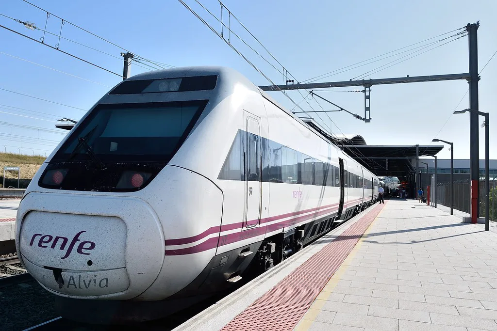 A Renfe Alvia high-speed train at the Burgos-Rosa Manzano railway station platform