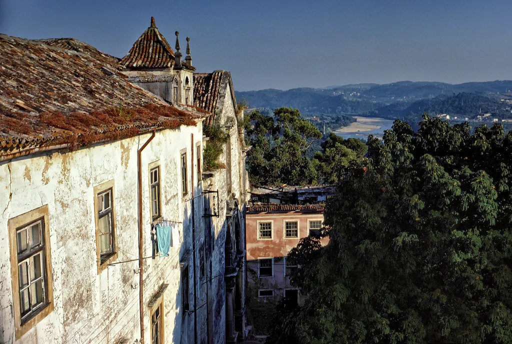 The Mondego River and Coimbra's riverside skyline, walkable from the Baixa