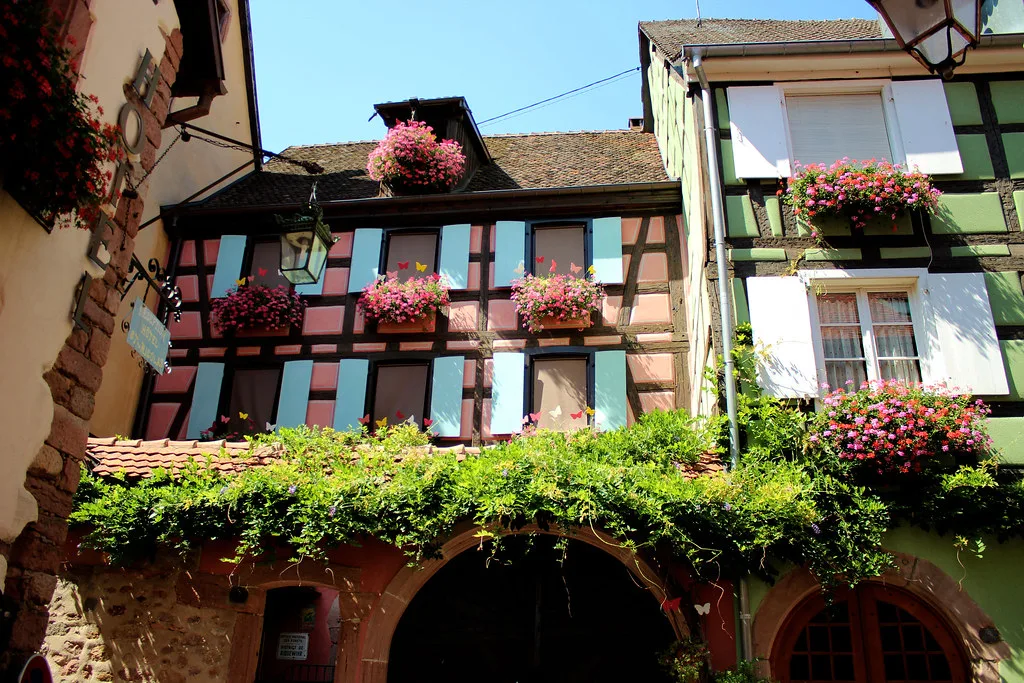 Cobbled lane in a half-timbered Alsace Wine Route village near Colmar