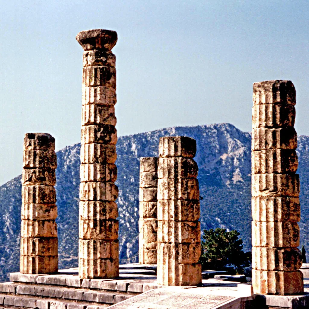 The standing columns of the Temple of Apollo at the Delphi Archaeological Site in Greece