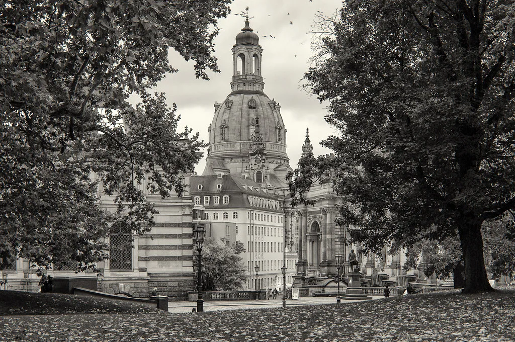 Dresden's Frauenkirche dome lit at dusk above the Neumarkt square in the Altstadt
