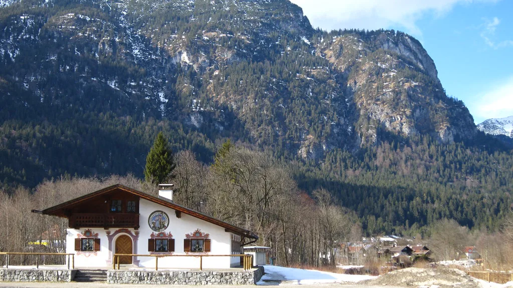 Traditional Bavarian buildings and alpine backdrop in the centre of Garmisch-Partenkirchen