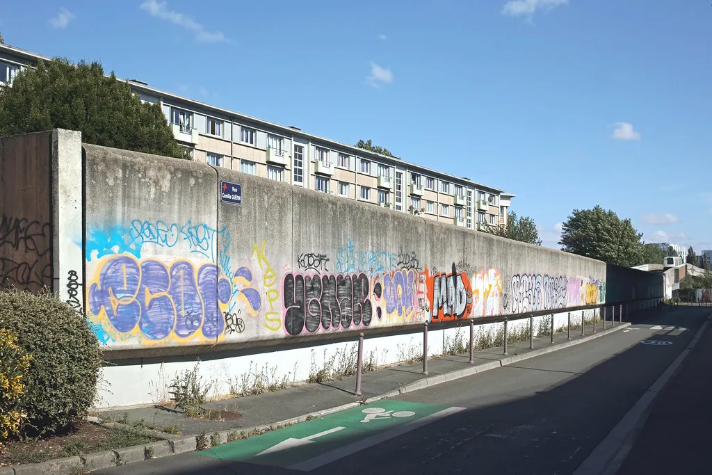 A signed metro station exit on a Lille street, part of the driverless VAL automatic metro network