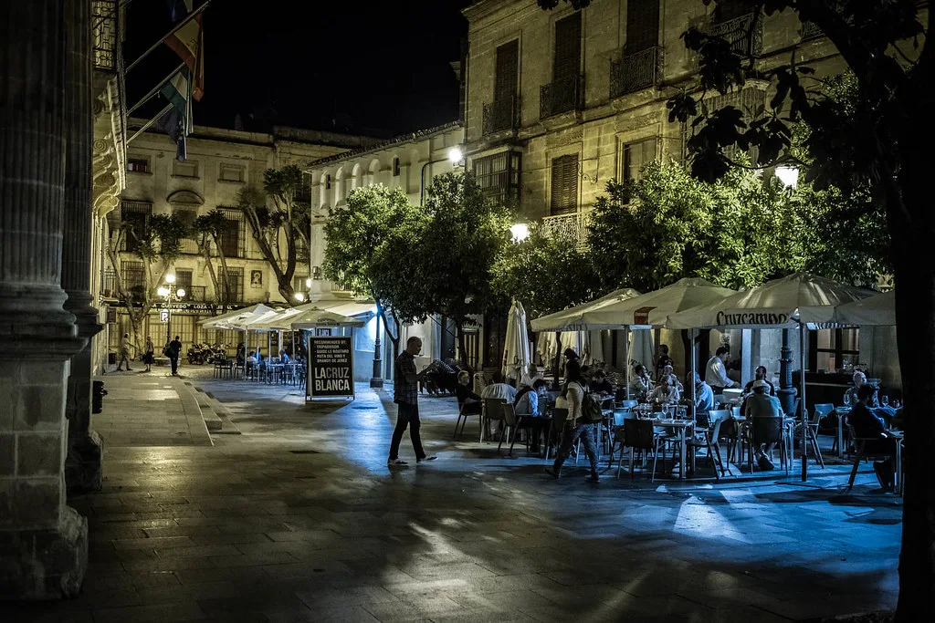 An evening view of the flat, walkable old-town streets of Jerez de la Frontera, where most major monuments sit within a short stroll of each other