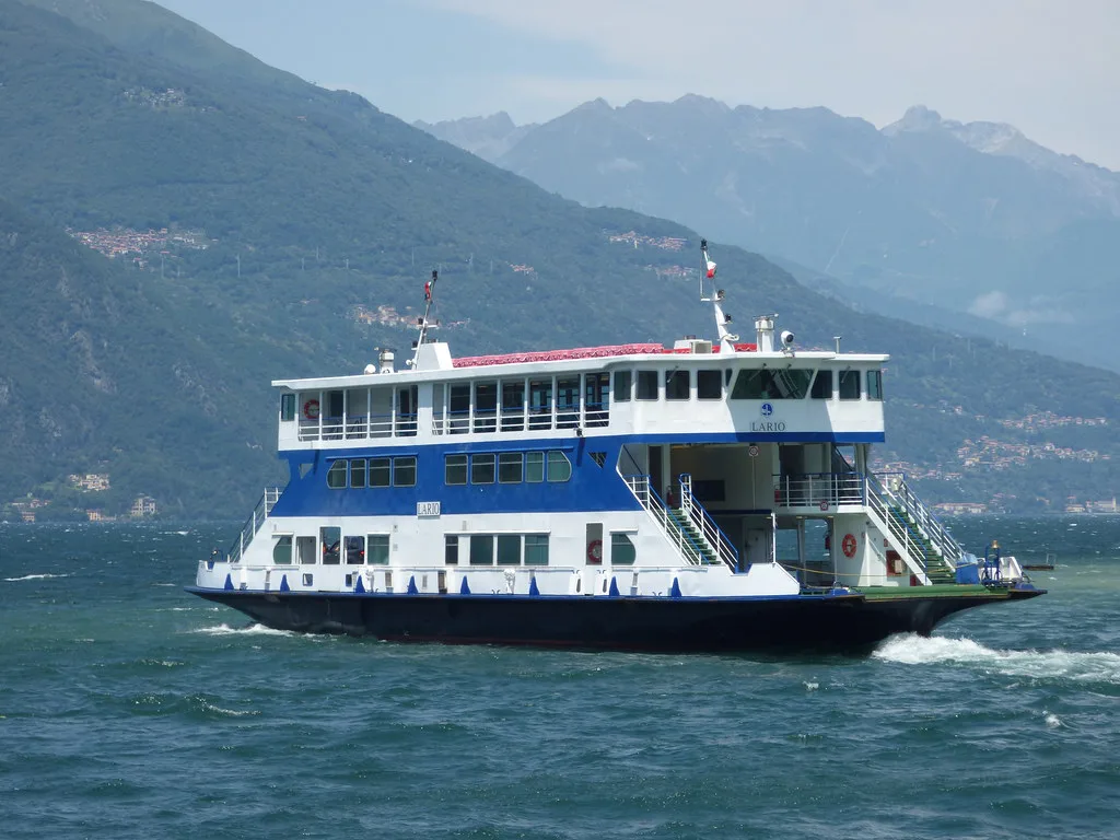 A Lake Como car ferry (Traghetto) loaded with vehicles crossing between Bellagio and Varenna