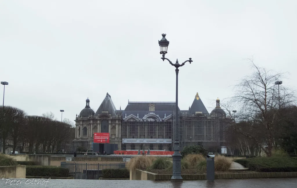 Cobbled street and architecture in Lille, easily reached by V'lille bike from metro exits