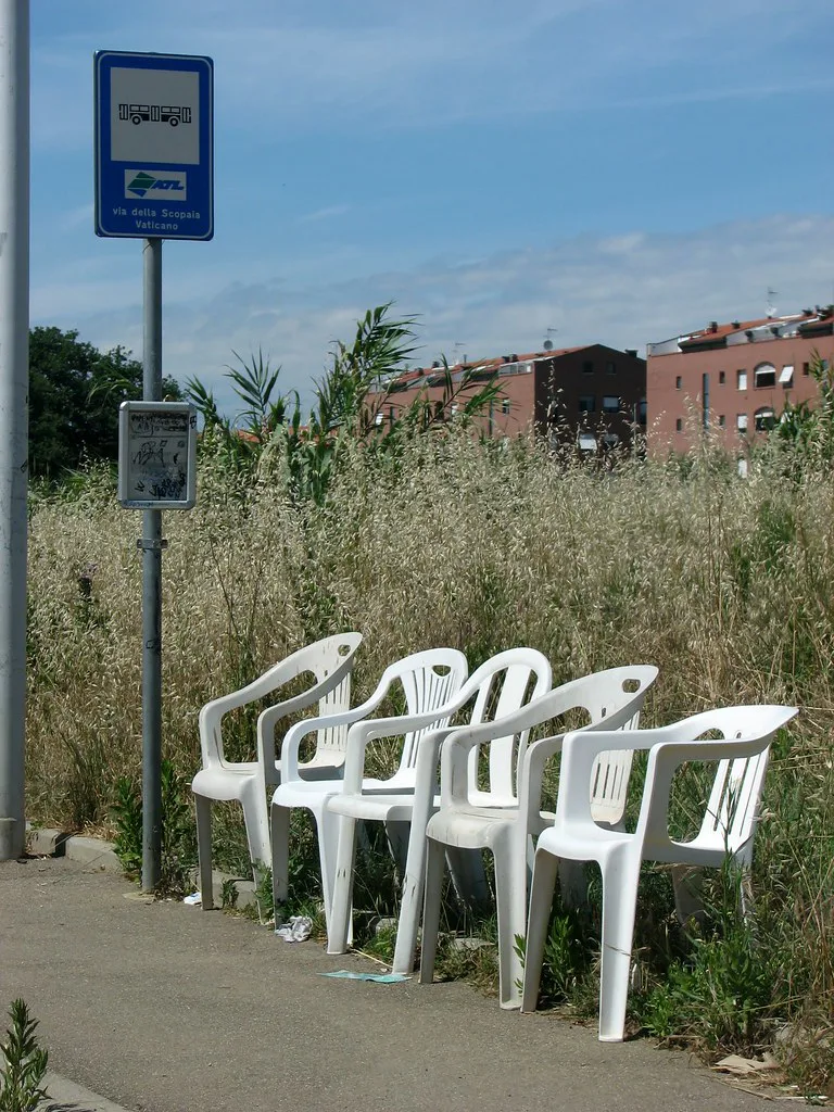A city bus stop on a street in Livorno, Tuscany