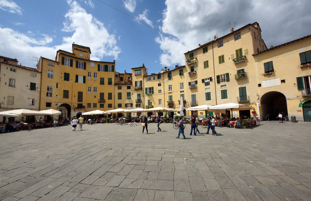A cobbled historic street inside Lucca's walls, a short walk from the paid parking lots outside the gates