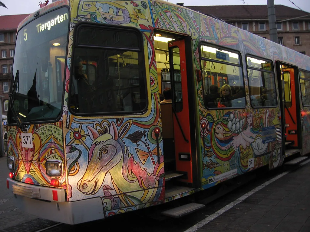 A Nuremberg tram travelling through a city street