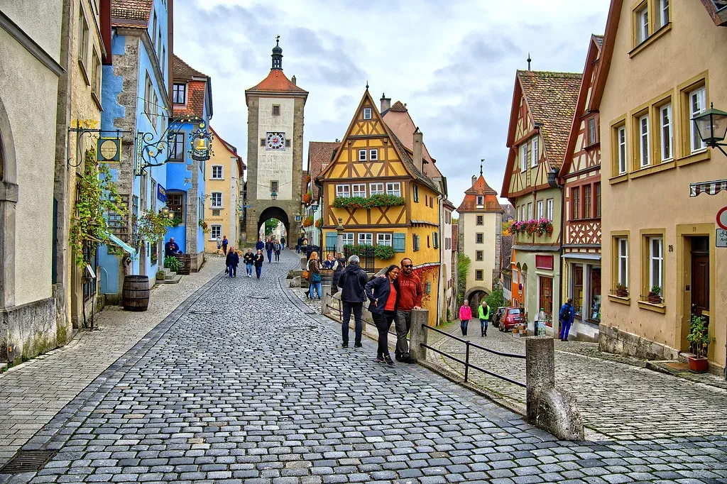 Half-timbered houses lining a cobbled street in the medieval old town of Rothenburg ob der Tauber