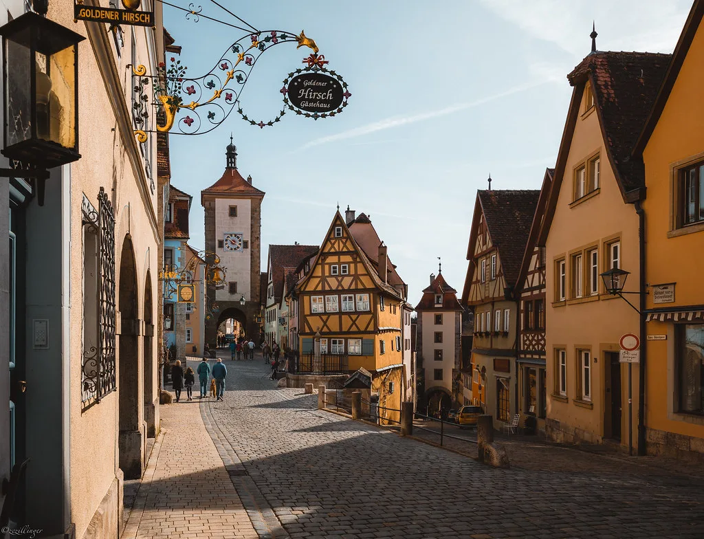 Panoramic view of Rothenburg ob der Tauber's red rooftops and town walls along the Romantic Road