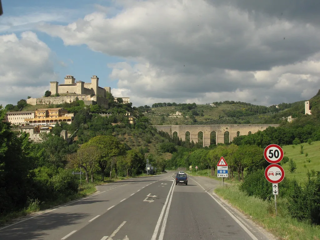 A narrow cobblestone street in Spoleto's historic centre, the camera-enforced ZTL zone drivers should avoid