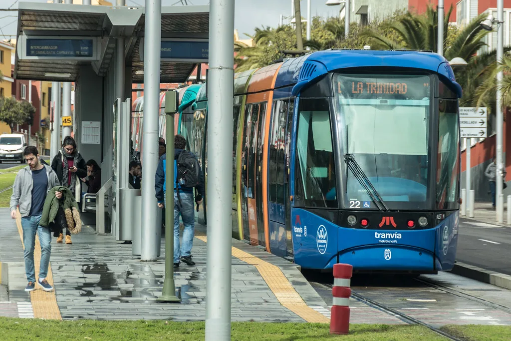 A green Metrotenerife tram carriage on Line 1 in Tenerife