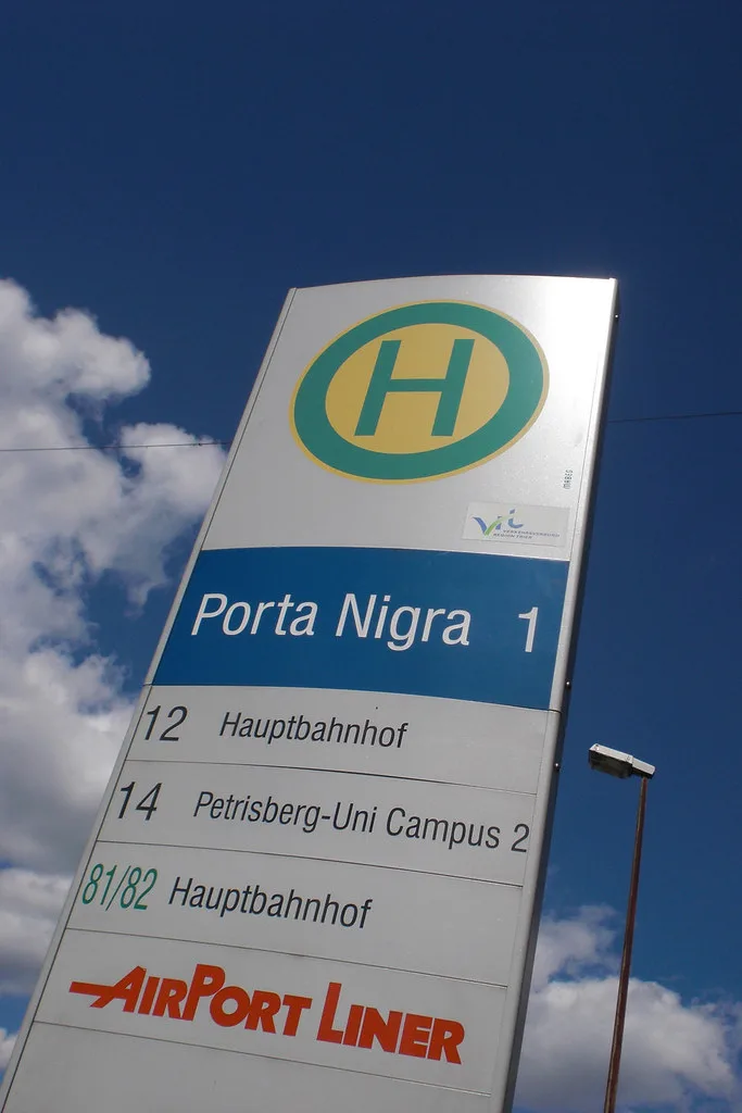 A city bus stop sign at Porta Nigra in Trier, a main hub on the VRT bus network
