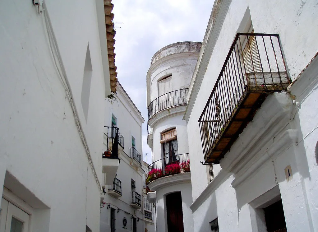 A whitewashed street in the historic center of Vejer de la Frontera near the La Corredera promenade