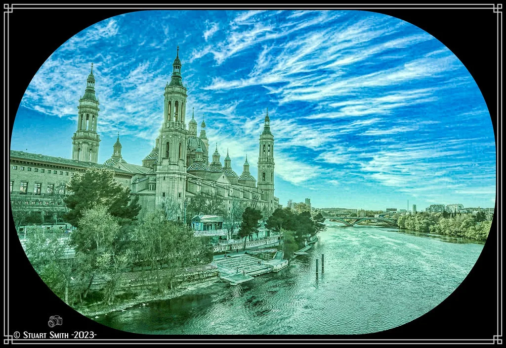 The Basílica del Pilar and its towers beside the Ebro River in Zaragoza